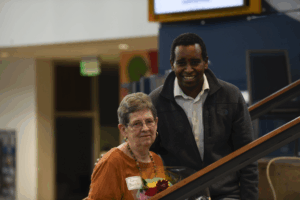 Carol Burkhart and Joe Neguse Roosevelt Dinner 2025